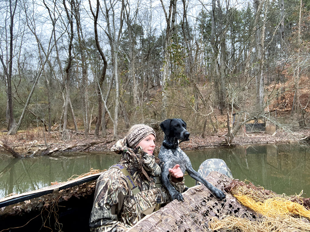 Mackenzie Smith conferring with her GSP, Izzy