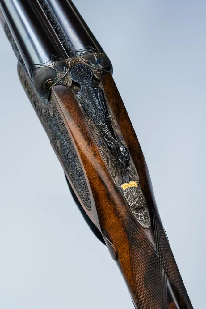 Dragonfly larvae feature on the top strap and lever, with the lever’s thumbpiece being a dragonfly’s tail end depositing eggs.