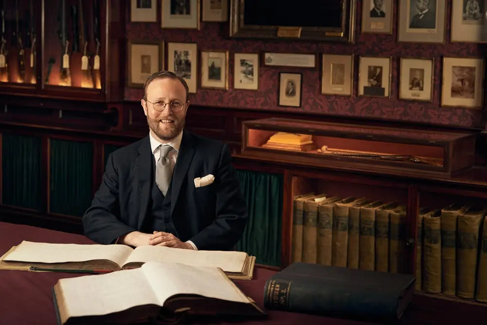 Man at desk.