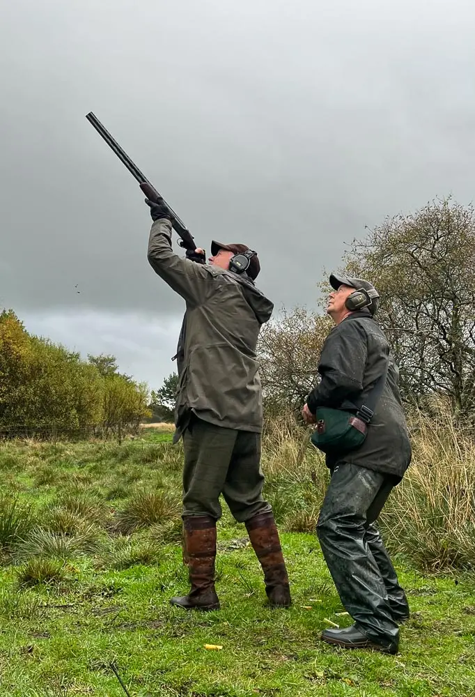 men take aim