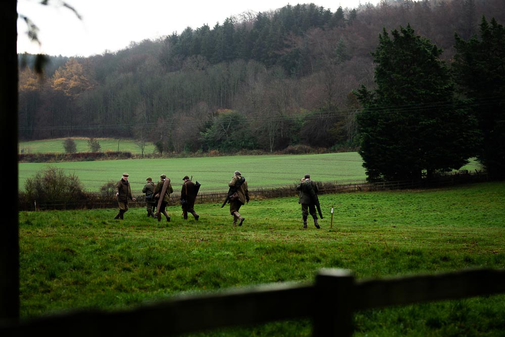 men walking in a line