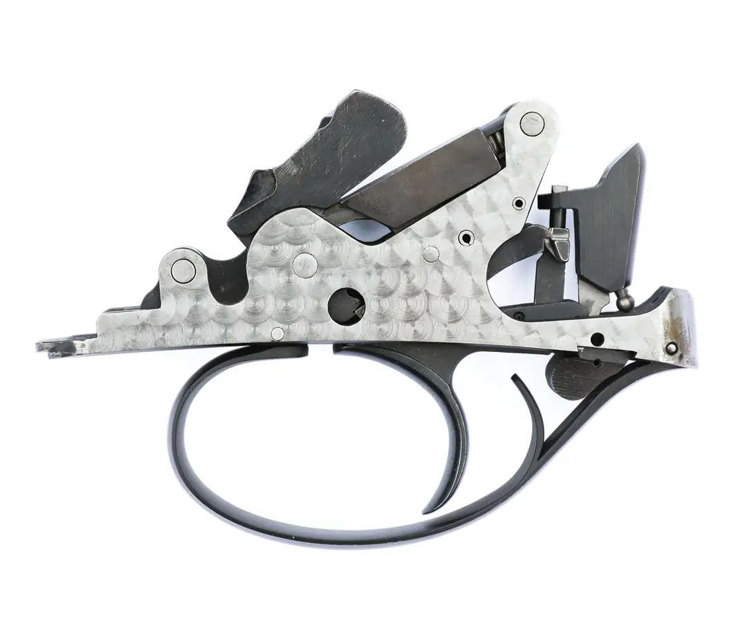 B Rizzini trigger on white background