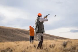 two hunters hunting on the range
