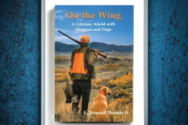 On The Wing cover with hunter and dog