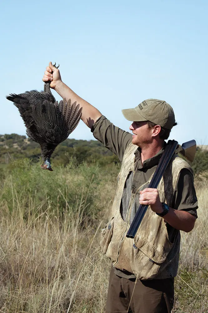 man showing off bird