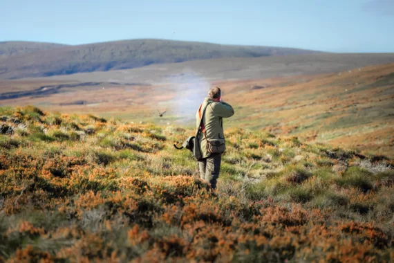hunter shooting bird