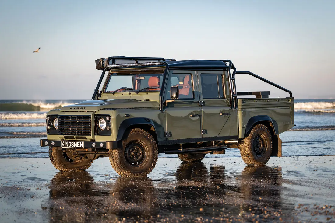 Green truck on the beach