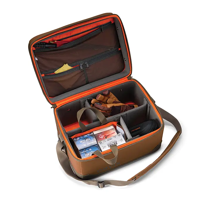 The orvis field bag. Orange inside with a brown exterior and strap.